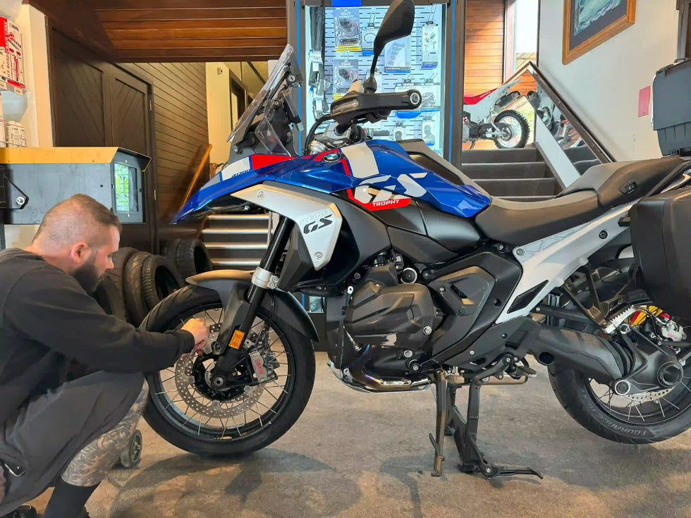 Our mechanic fixing a motorcycle at our workshop